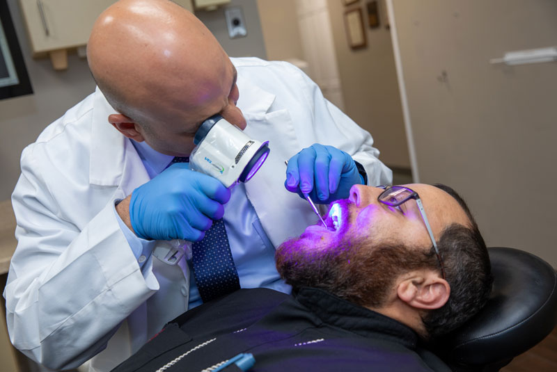 dr hanna performing dental scan