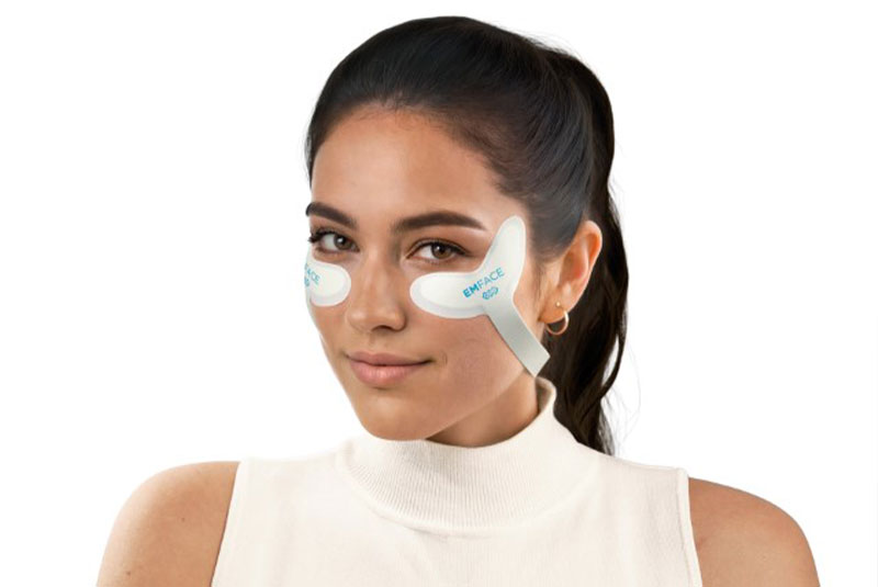 woman with emface under her eyes